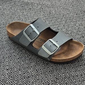 Birkenstock Black and Brown Sandals It's only the sandal for the right foot.